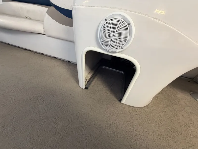 Slide: The Image of A speaker is integrated into the boat's white paneling, with a storage compartment below. - 16