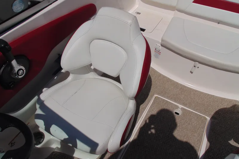 Slide: The Image of White captain's chair in 2013 Chaparral 19 Sport H2O boat interior. - 14