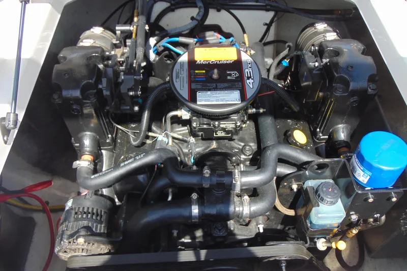 Slide: The Image of Engine compartment of a 2013 Chaparral 19 Sport H2O boat with MerCruiser 4.3L engine. - 16