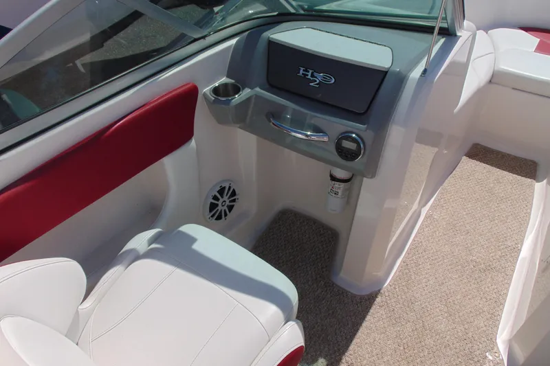 Slide: The Image of Interior of 2013 Chaparral 19 Sport H2O boat with white and red seating. - 9