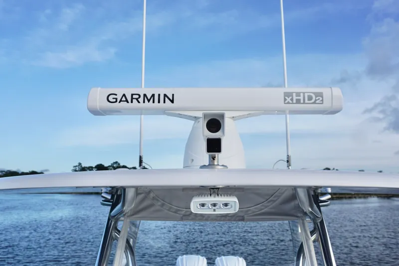 Slide: The Image of 2022 Contender 28 Tournament boat with Garmin xHD2 radar on calm water. - 19