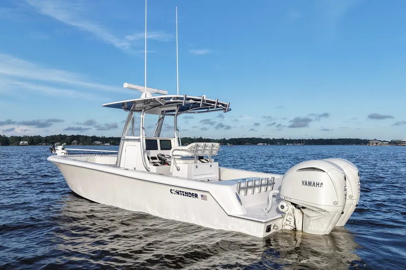 Slide: The Image of 2022 Contender 28 Tournament boat with Yamaha engines on open water. - 6