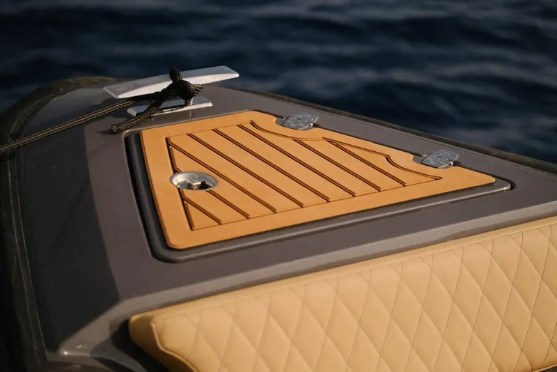 Slide: The Image of Luxury deck of 2026 Northstar Orion 7 boat with elegant wood finish. - 11