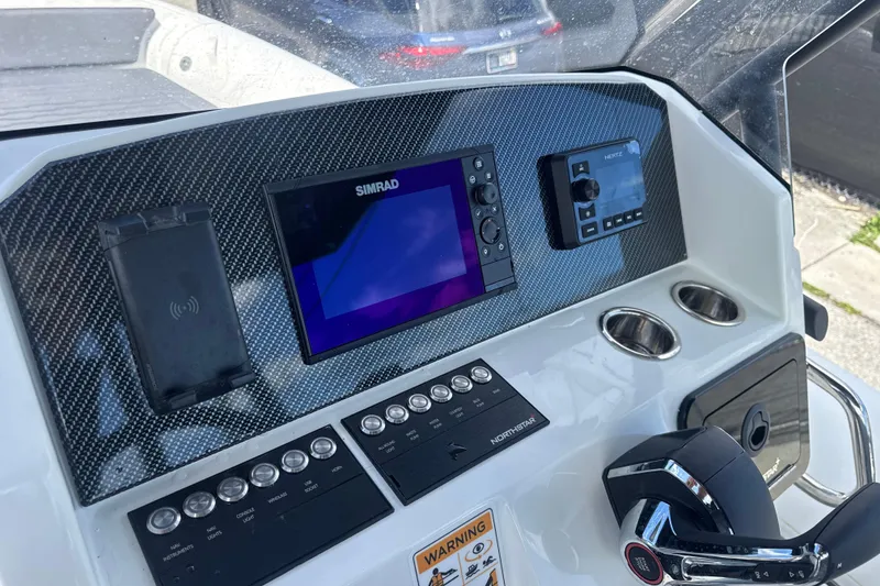 Slide: The Image of Dashboard of 2026 Northstar Orion 7 boat with Simrad display and controls. - 6