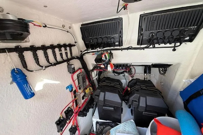 Slide: The Image of Electrical system inside 2023 Pair Customs 24 Center Console DV boat. - 26