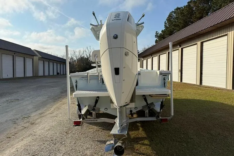 Slide: The Image of 2023 Pair Customs 24 Center Console DV boat with powerful outboard motor. - 3