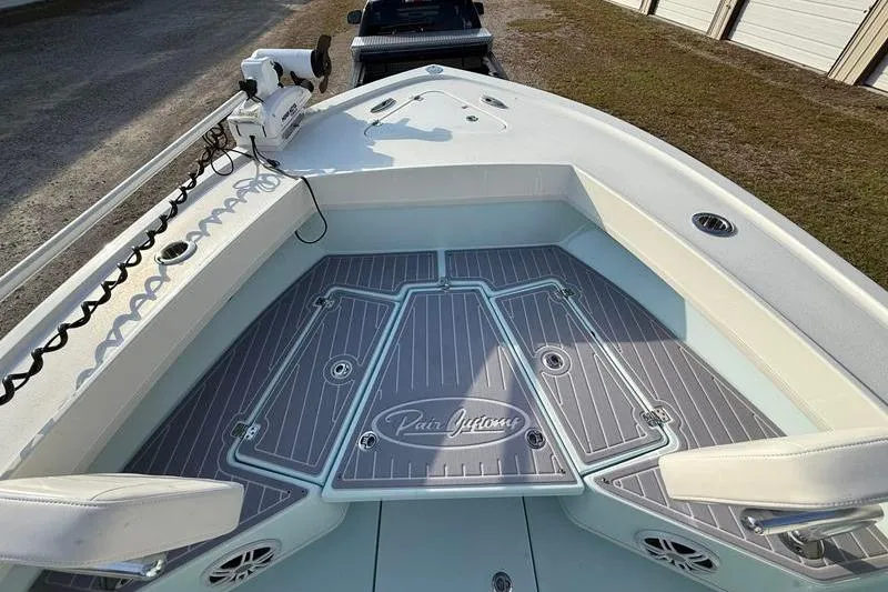 Slide: The Image of 2023 Pair Customs 24 Center Console DV boat deck with custom flooring. - 30