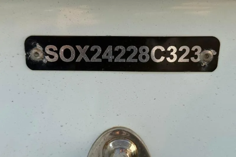 Slide: The Image of Hull identification number on 2023 Pair Customs 24 Center Console DV boat. - 34