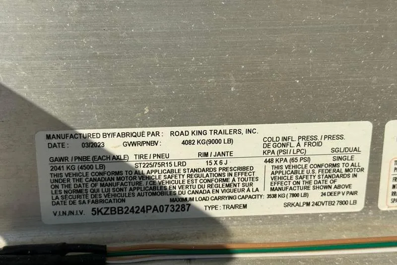 Slide: The Image of Road King Trailers label with specifications and VIN for 2023 Pair Customs 24 Center Console DV. - 36