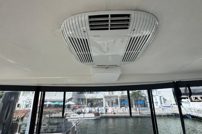 Slide: The Image of Ceiling air conditioning unit inside a 2003 Silverton 43 Motor Yacht, dockside view. - 13