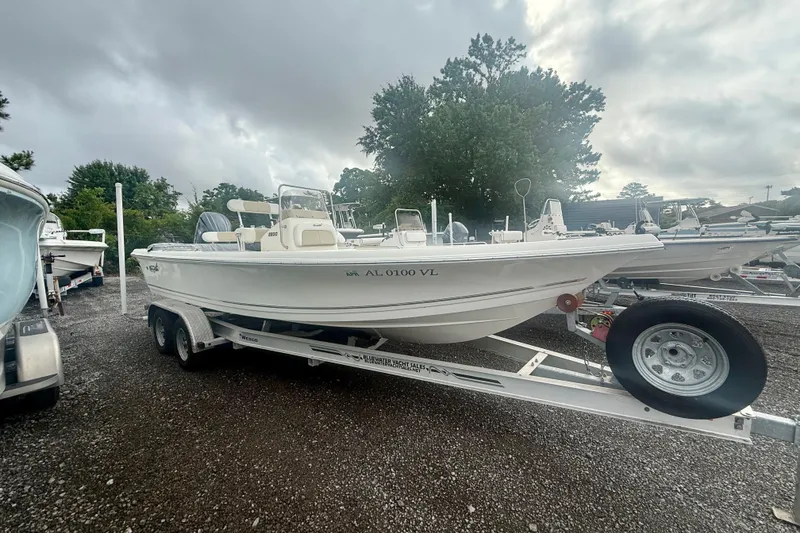 The Image of 2021 Bulls Bay 2200 boat on trailer, parked outdoors under cloudy sky. - 0