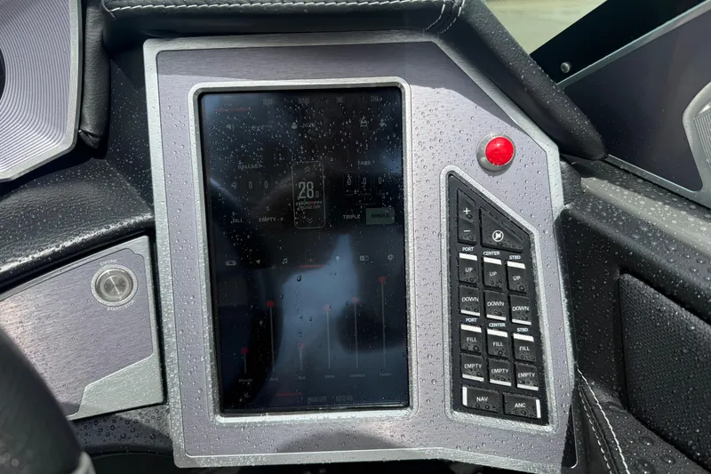 Slide: The Image of Dashboard of a 2021 MasterCraft XT22 boat with touchscreen controls. - 17