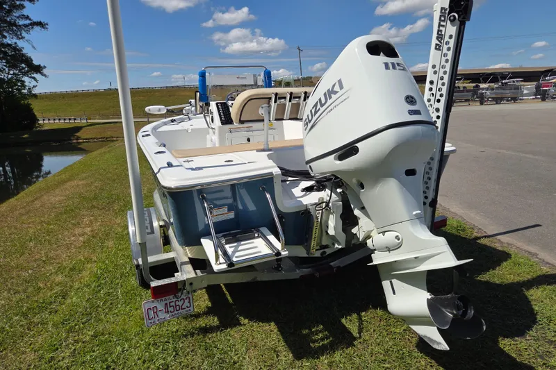 Slide: The Image of 2024 Sea Pro 172 Bay boat with Suzuki outboard motor on trailer. - 4