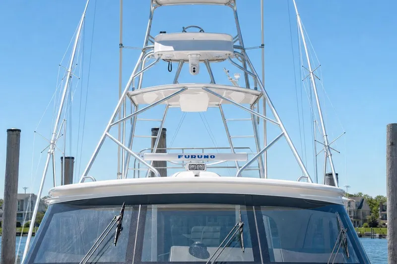 Slide: The Image of 2008 Viking 52 Sport Coupe yacht with tower and radar equipment. - 20
