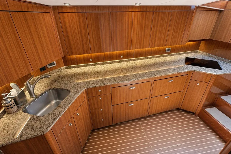 Slide: The Image of Luxurious wooden kitchen interior of 2008 Viking 52 Sport Coupe yacht. - 8
