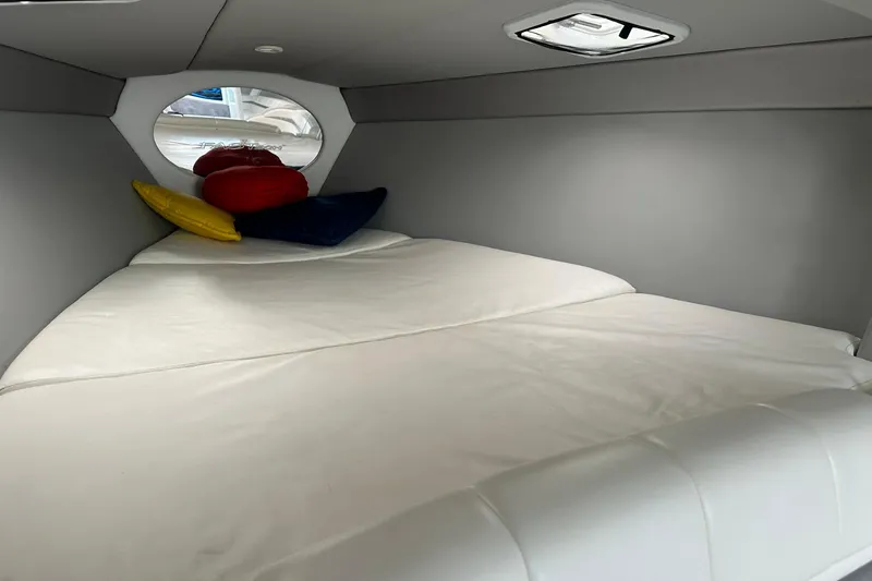 Slide: The Image of Interior cabin of 2003 Formula 353 FASTech boat with cushions and porthole. - 22