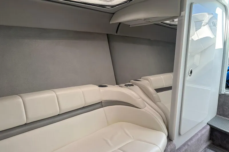 Slide: The Image of Interior of a 2003 Formula 353 FASTech boat with plush seating and modern design. - 23