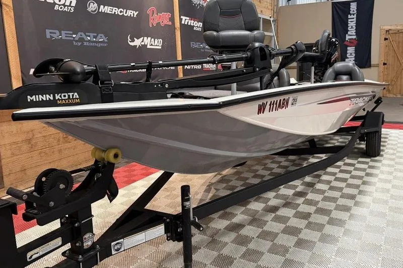 Slide: The Image of 2024 Tracker Pro Team 190 TX boat on display with Minn Kota Maxxum motor. - 5