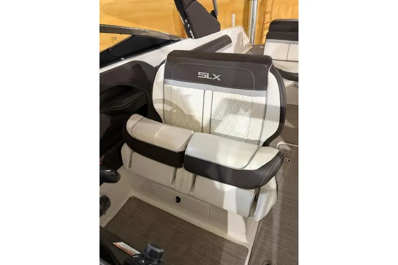 Slide: The Image of 2016 Sea Ray SLX 280 boat seat with elegant white and black upholstery. - 4
