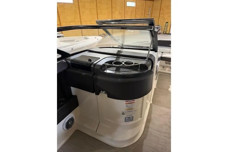 Slide: The Image of Interior view of 2016 Sea Ray SLX 280 boat with cup holders and dashboard. - 5