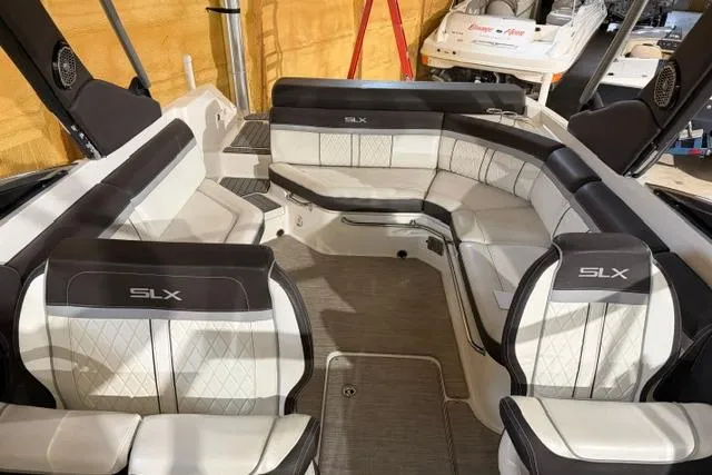 Slide: The Image of 2016 Sea Ray SLX 280 boat interior with luxurious seating and modern design. - 6