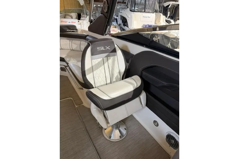 Slide: The Image of 2016 Sea Ray SLX 280 boat interior with luxurious seating and modern design. - 7