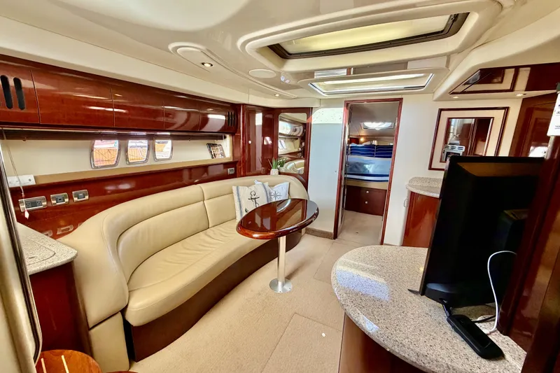 Slide: The Image of Luxurious interior of 2008 Sea Ray 44 Sundancer yacht with elegant seating and modern amenities. - 22