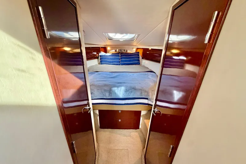 Slide: The Image of Luxurious cabin interior of 2008 Sea Ray 44 Sundancer yacht with cozy bedding. - 30