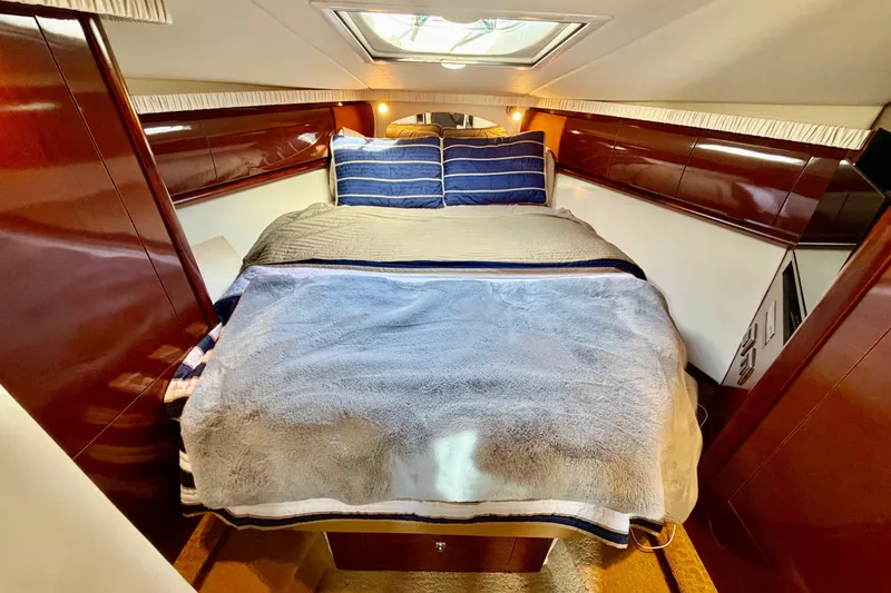 Slide: The Image of Luxurious cabin interior of 2008 Sea Ray 44 Sundancer yacht with cozy bedding. - 31