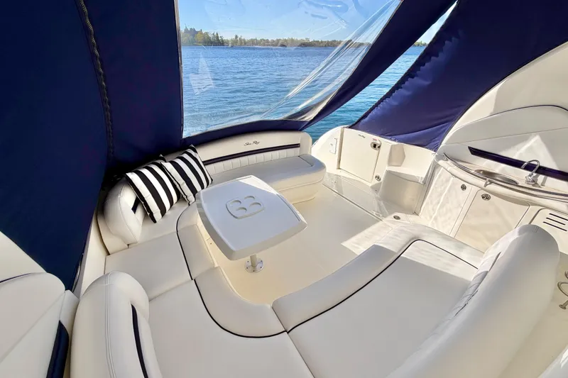 Slide: The Image of Luxurious interior of 2008 Sea Ray 44 Sundancer yacht with elegant seating and scenic water view. - 38