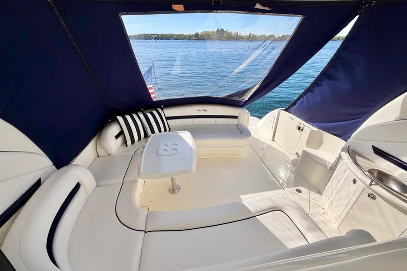 Slide: The Image of Luxurious 2008 Sea Ray 44 Sundancer yacht interior with elegant seating and scenic water view. - 39