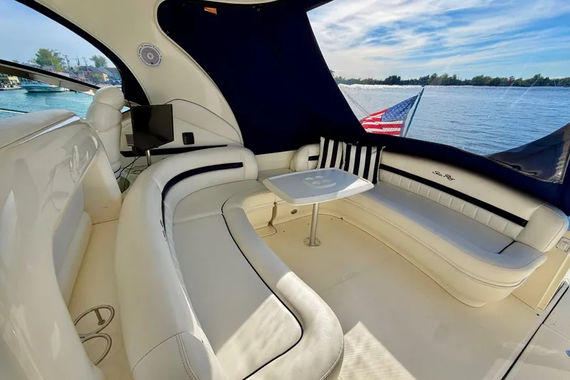 Slide: The Image of Luxurious 2008 Sea Ray 44 Sundancer yacht interior with elegant seating and scenic water view. - 41