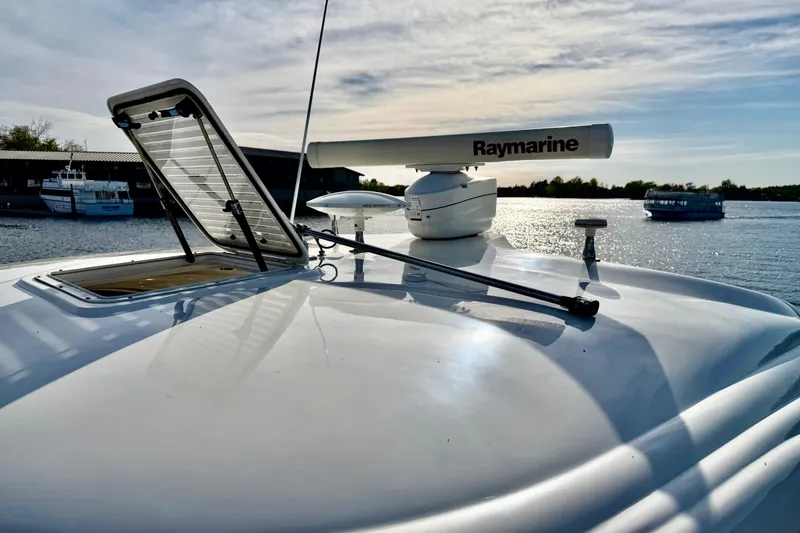 Slide: The Image of 2008 Sea Ray 44 Sundancer yacht with Raymarine radar on a sunny day. - 50