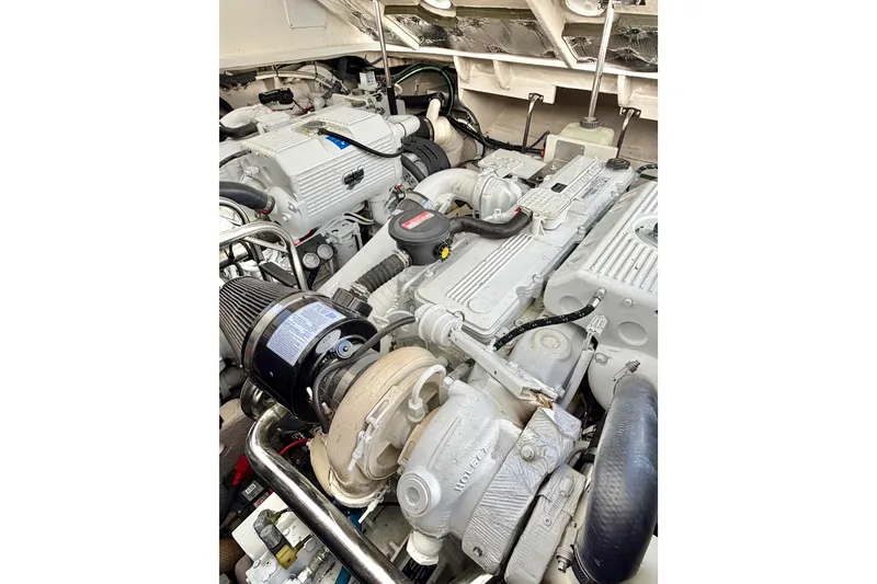 Slide: The Image of Engine room of 2008 Sea Ray 44 Sundancer yacht, showcasing dual engines. - 55