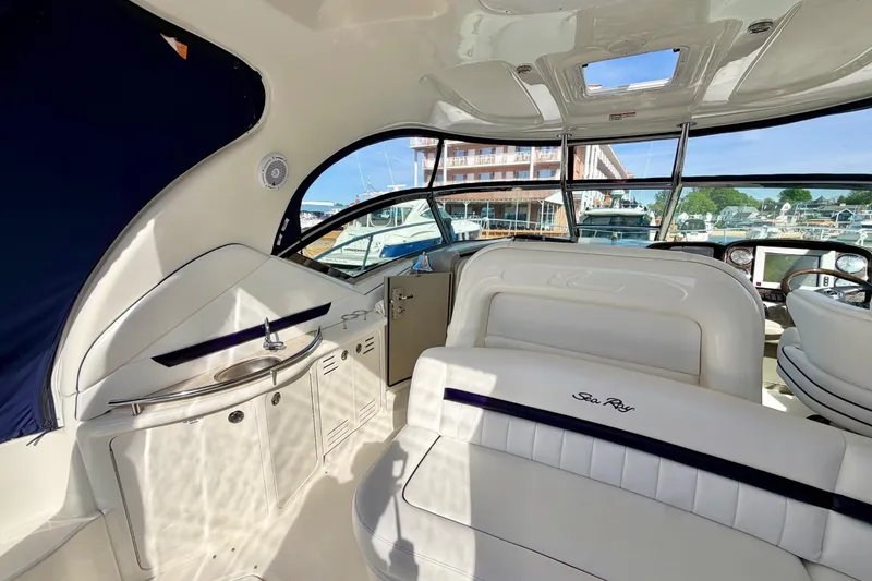 Slide: The Image of Luxurious interior of 2008 Sea Ray 44 Sundancer yacht with elegant seating and helm. - 8