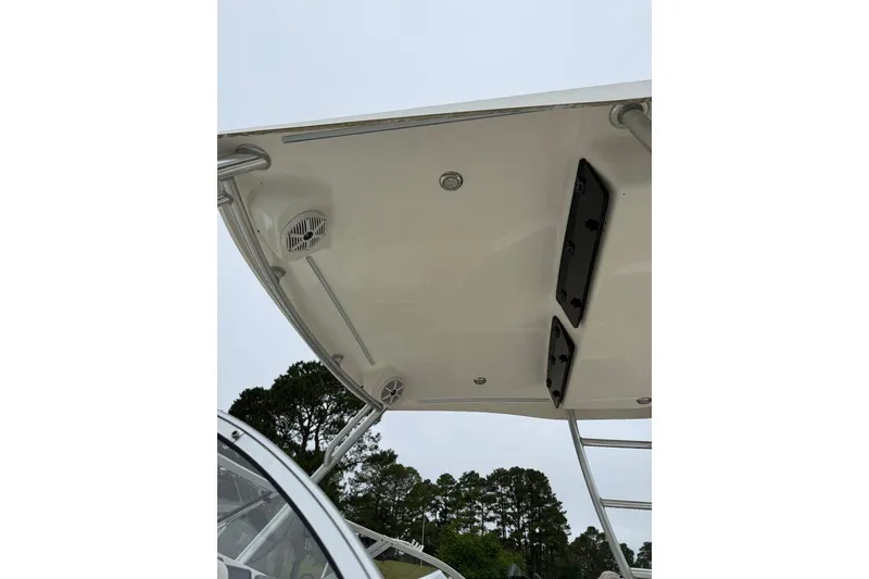 Slide: The Image of 2018 Key West 239 DFS boat canopy with speakers and rod holders, viewed from below. - 6