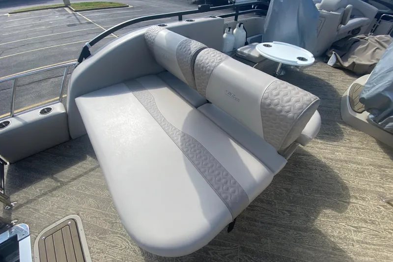Slide: The Image of Luxurious seating on 2023 JC Swingback 27 TT Sport pontoon boat, featuring elegant upholstery. - 11