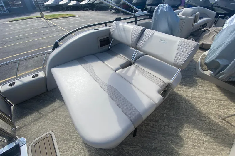 Slide: The Image of Luxurious seating on 2023 JC Swingback 27 TT Sport boat, featuring elegant gray upholstery. - 12