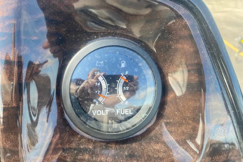 Slide: The Image of Close-up of 2023 JC Swingback 27 TT Sport fuel and volt gauge. - 23