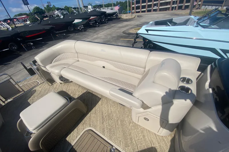 Slide: The Image of 2023 JC Swingback 27 TT Sport boat interior with luxurious seating and cup holders. - 30