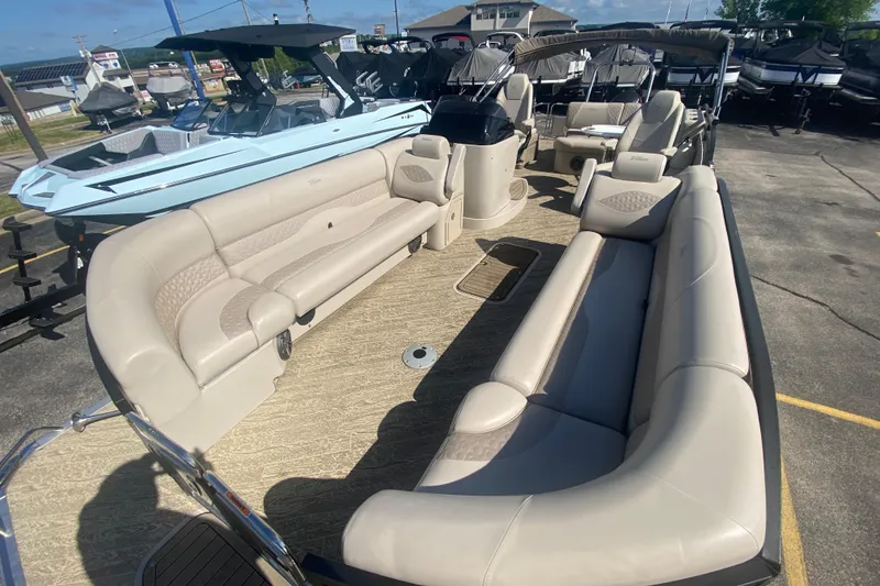 Slide: The Image of 2023 JC Swingback 27 TT Sport pontoon boat with spacious seating and modern design. - 7