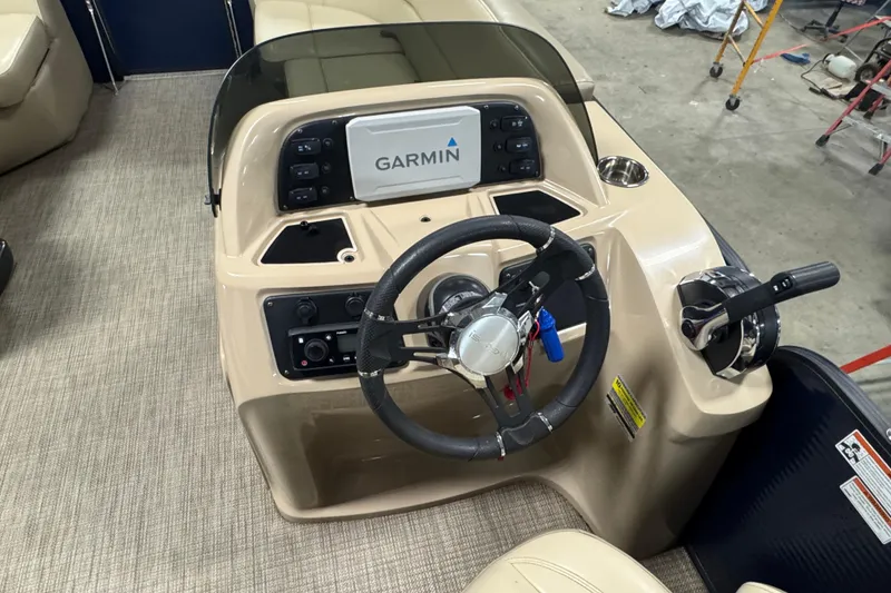 Slide: The Image of 2021 Manitou 22 Aurora LE Standard boat dashboard with Garmin navigation system. - 9