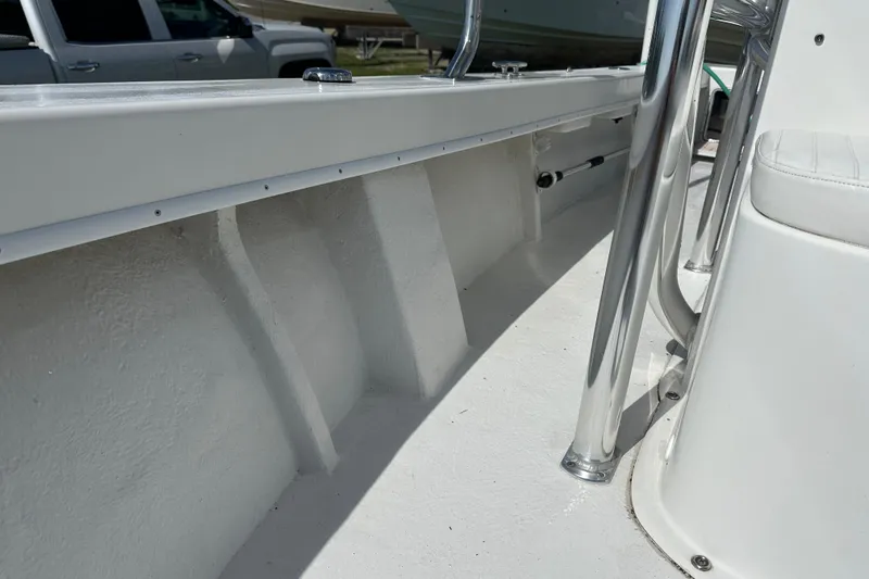 Slide: The Image of 2021 C-Hawk 23 Center Console boat interior with stainless steel railings. - 13
