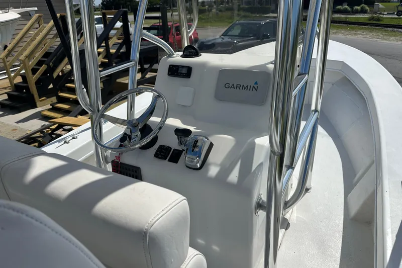Slide: The Image of 2021 C-Hawk 23 Center Console boat interior with Garmin navigation system. - 19