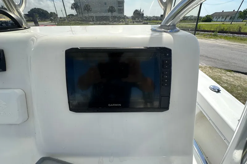 Slide: The Image of Garmin display on 2021 C-Hawk 23 Center Console boat dashboard. - 21