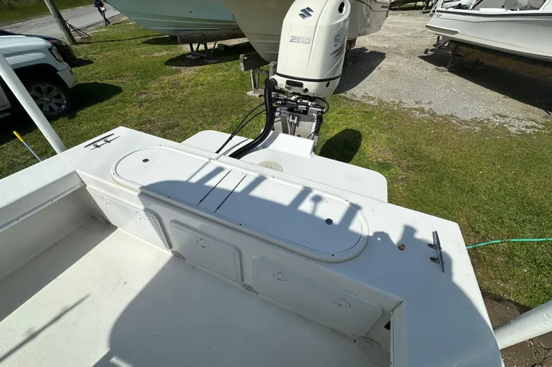 Slide: The Image of 2021 C-Hawk 23 Center Console boat with Suzuki 200 outboard motor. - 30