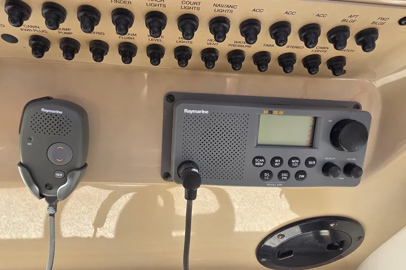 Slide: The Image of Control panel of a 2007 Chaparral Signature 250 with Raymarine marine radio. - 15