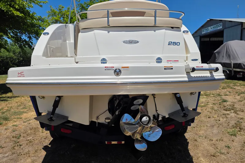 Slide: The Image of Rear view of a 2007 Chaparral Signature 250 boat with dual propellers. - 5