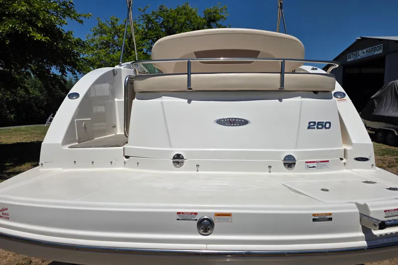 Slide: The Image of 2007 Chaparral Signature 250 boat rear view with swim platform and seating. - 7