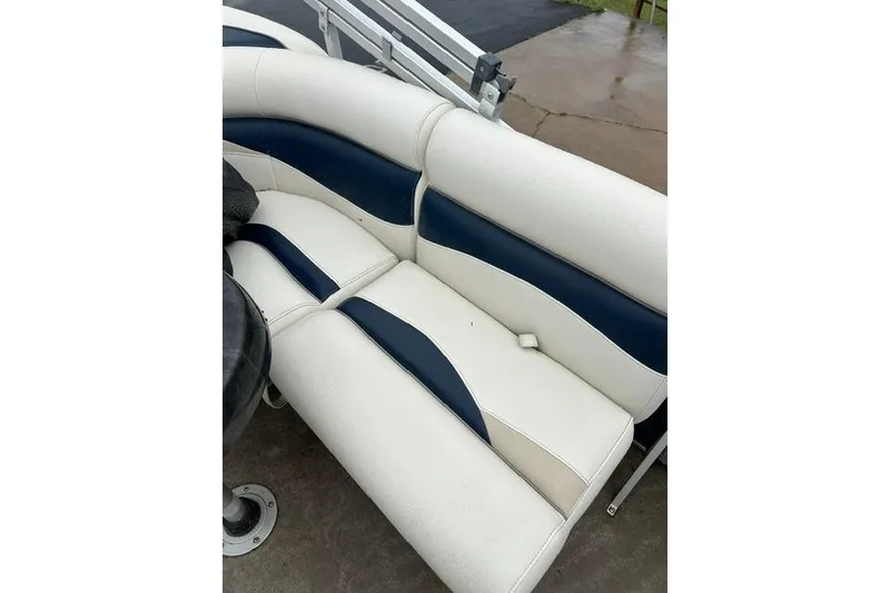 Slide: The Image of White and blue seating on 2015 Godfrey Sweetwater 1880 CX boat. - 13